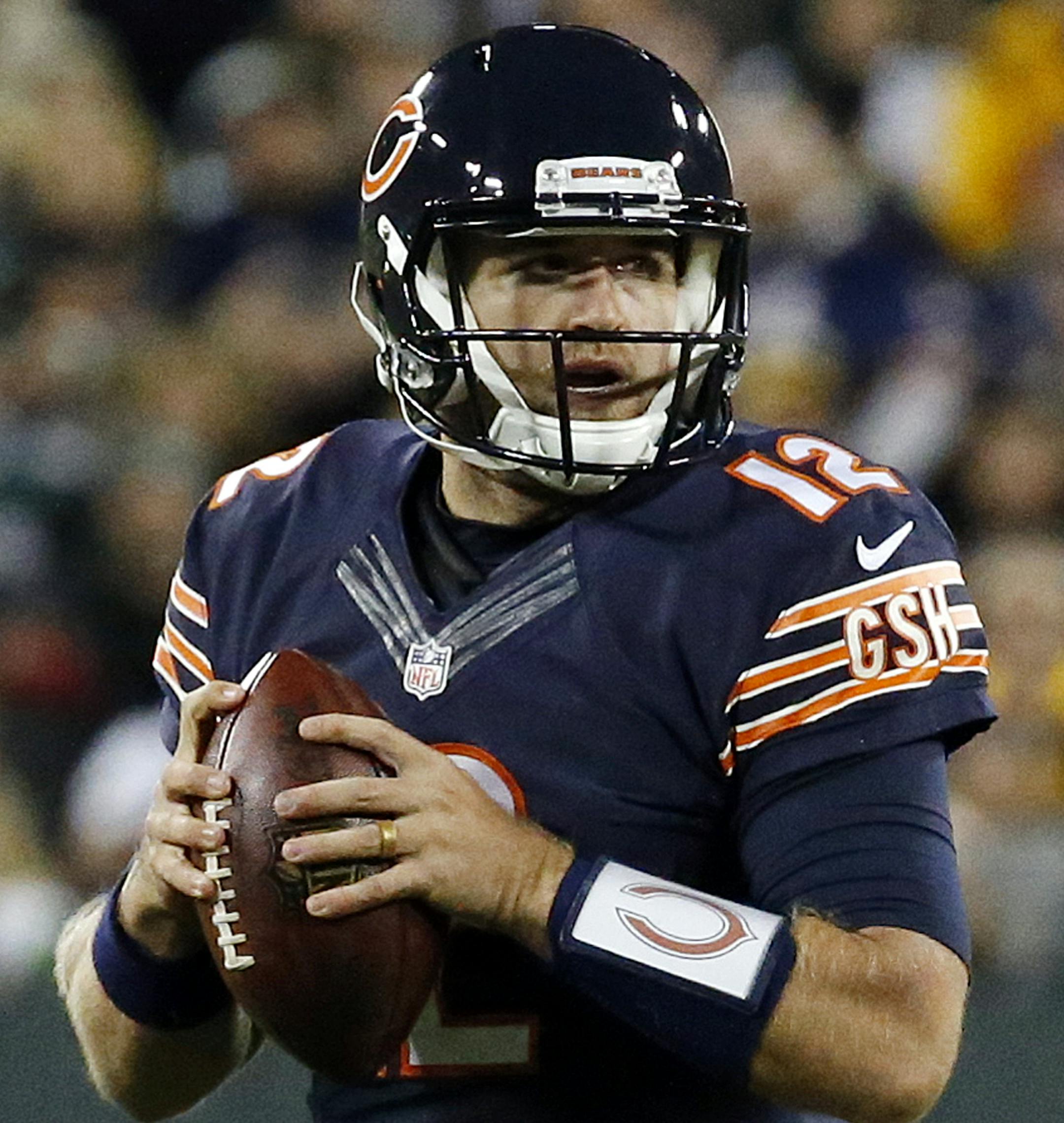 Chicago Bears quarterback Matt Barkley (12) looks for a receiver during the first half of an NFL football game against the Green Bay Packers, Thursday, Oct. 20, 2016, in Green Bay, Wis. (AP Photo/Mike Roemer)
