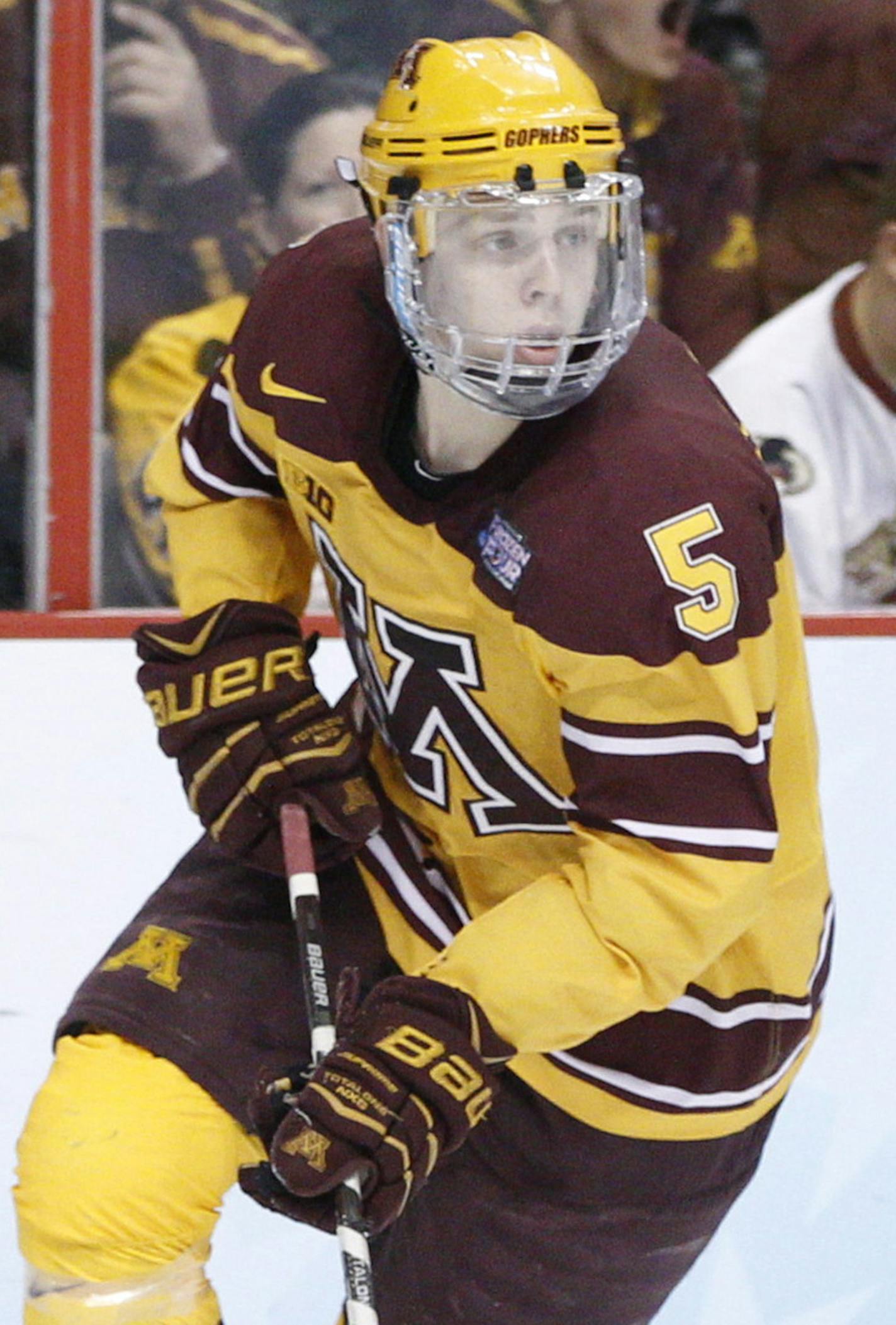 Minnesota's Mike Reilly in action during the third period of an NCAA men's college hockey Frozen Four tournament game against North Dakota, Thursday, April 10, 2014, in Philadelphia. Minnesota won 2-1. (AP Photo/Chris Szagola) ORG XMIT: OTKCS166