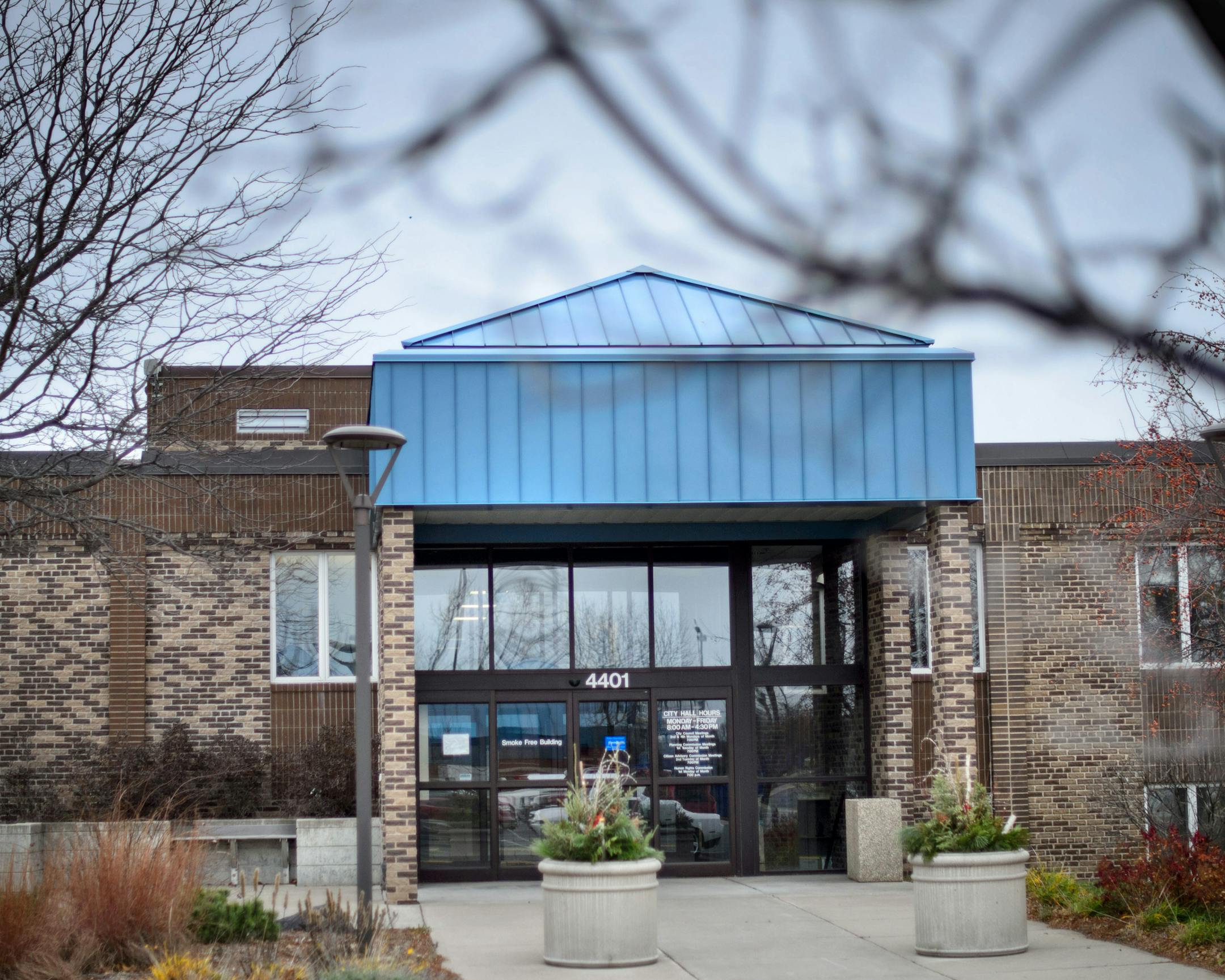 New Hope City Hall ] GLEN STUBBE * gstubbe@startribune.com Friday, November 20, 2015 New Hope City Hall is a classic 1960s split level with all the accompanying problems. The 1968 building is full of low ceilings and cramped, awkward spaces. The mayor gave up her office years ago to make room for computer servers. We photograph Mayor Kathi Hemken @ city Hall, in the old mayors office which is now where they store servers.