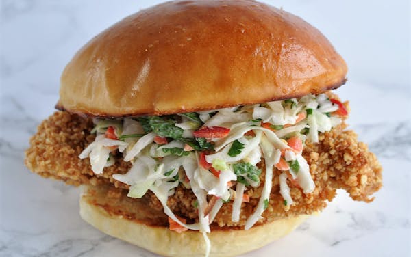 Peanut-Crusted Chicken Sandwich with Red Chile Slaw.