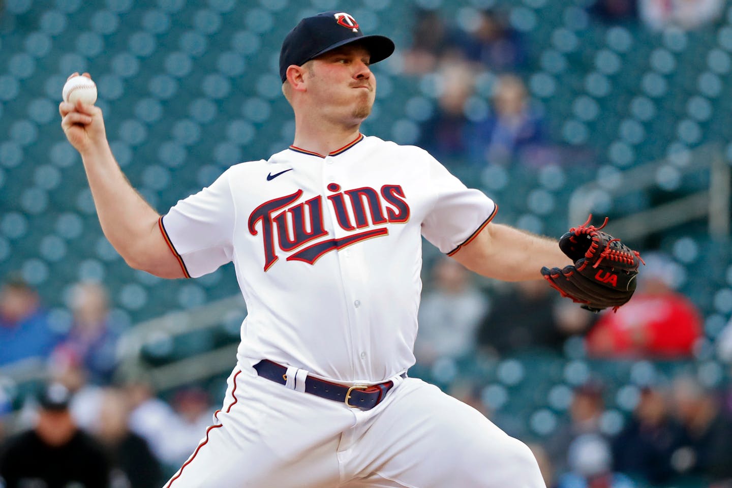 Minnesota Twins starting pitcher Dylan Bundy throws to the Seattle Mariners in the first inning of a baseball game Monday, April 11, 2022, in Minneapolis. (AP Photo/Bruce Kluckhohn)