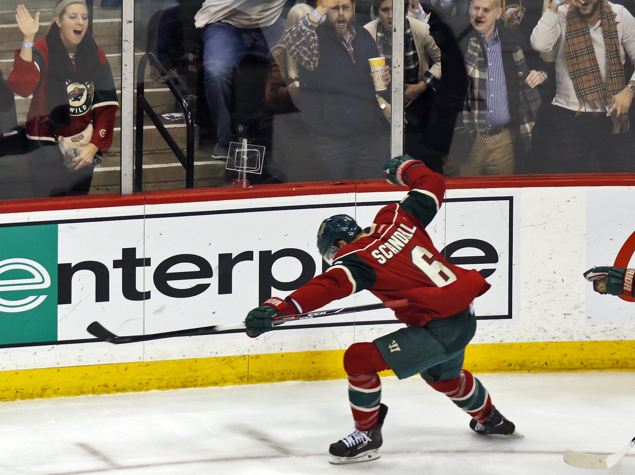 Minnesota Wild vs. Buffalo Sabres. Minnesota scored three goals in the 2nd period. Marco Scandella celebrated with fans after scoring a goal in the 2nd period. (MARLIN LEVISON/STARTRIBUNE(mlevison@startribune.com)