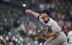 Jose Berrios pitches during the first inning of a game against the Brewers on Saturday