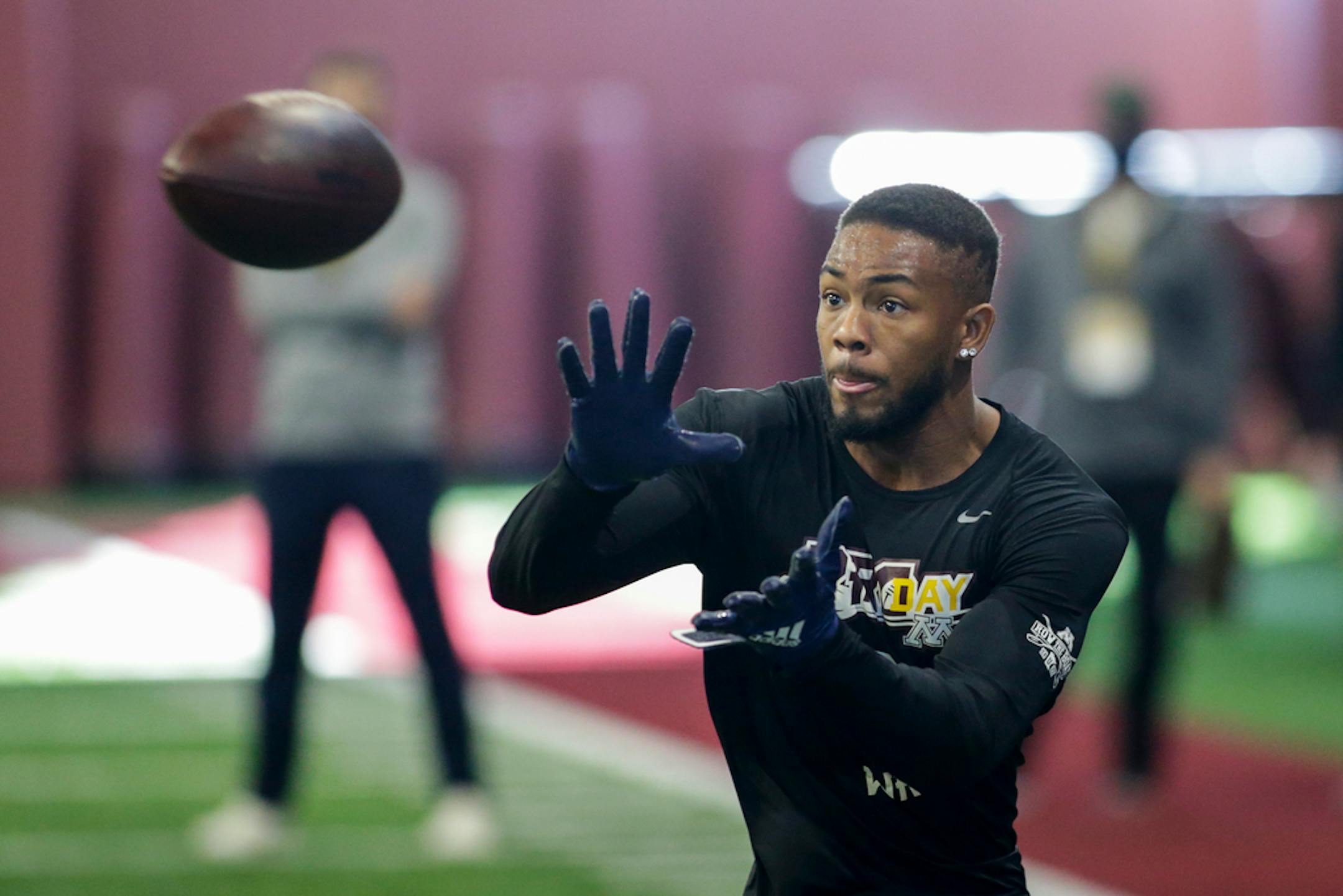 Minnesota wide receiver Rashod Bateman makes a catch during Minnesota NFL football Pro Day.