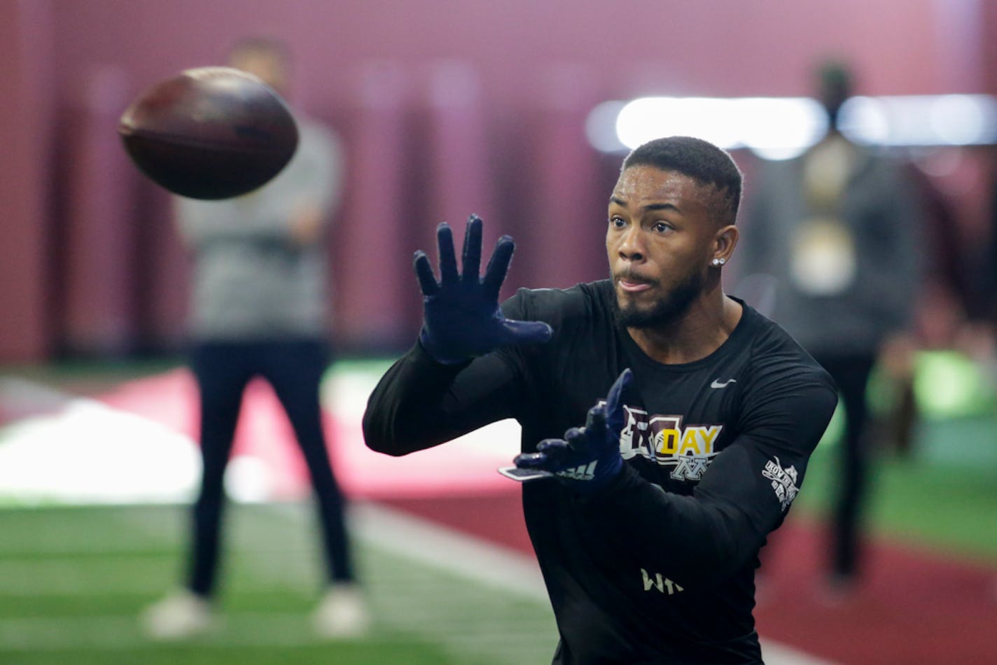 Minnesota wide receiver Rashod Bateman makes a catch during Minnesota NFL football Pro Day.