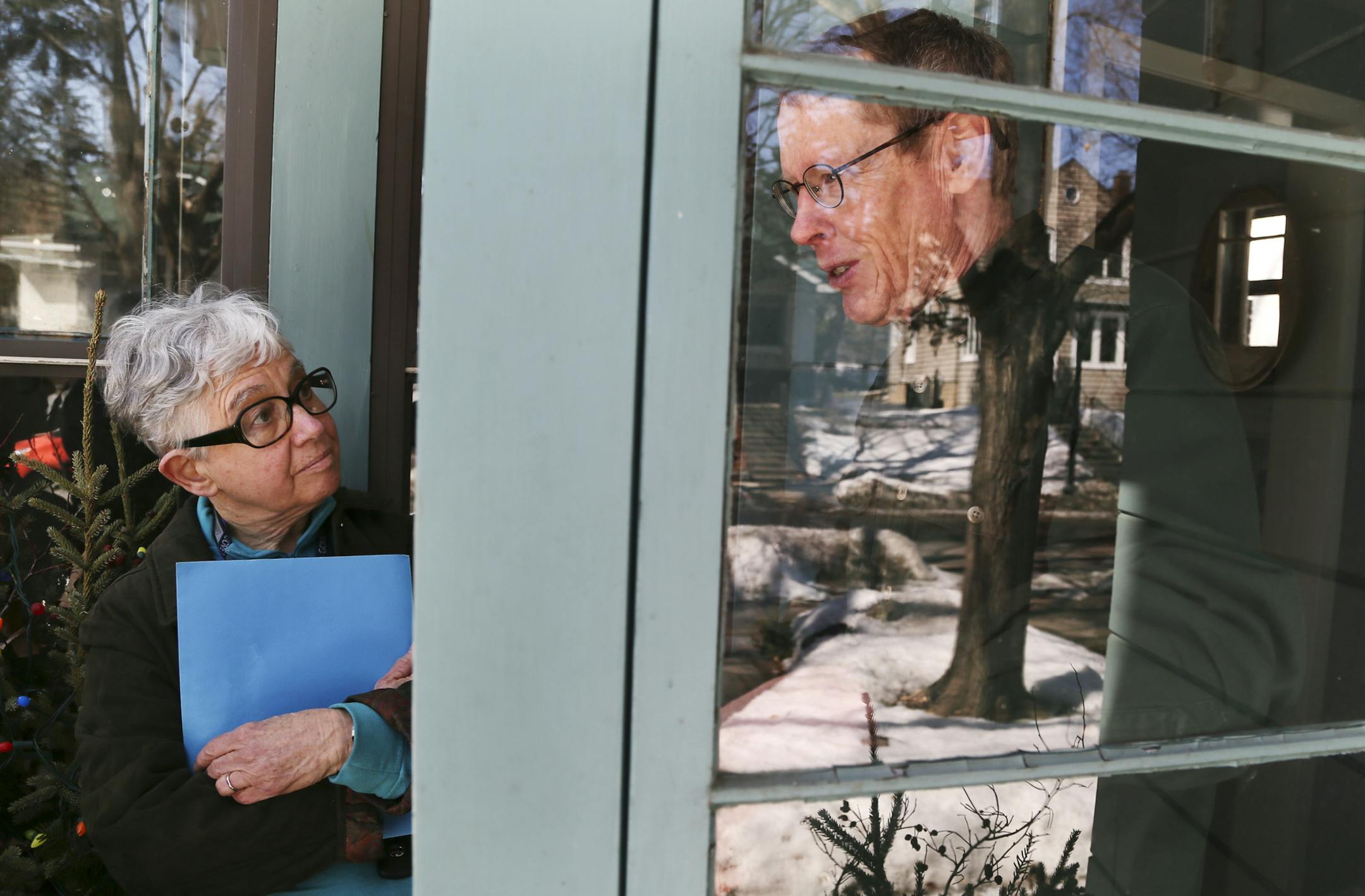 Long-serving State Rep. Phyllis Kahn went on door knocking in the Procpect Park neighborhood to check in on delegates in her district, including Chip Halbach, right, Saturday, March 29, 2014, in Minneapolis, MN.](DAVID JOLES/STARTRIBUNE) djoles@startribune.com State Rep. Phyllis Kahn, a stalwart of DFL politics at the Capitol, is in a serious fight to retain her seat after a challenge from school board member Mohamud Noor. We'll shadow both candidates for a setup to Saturday's endorsing conventi