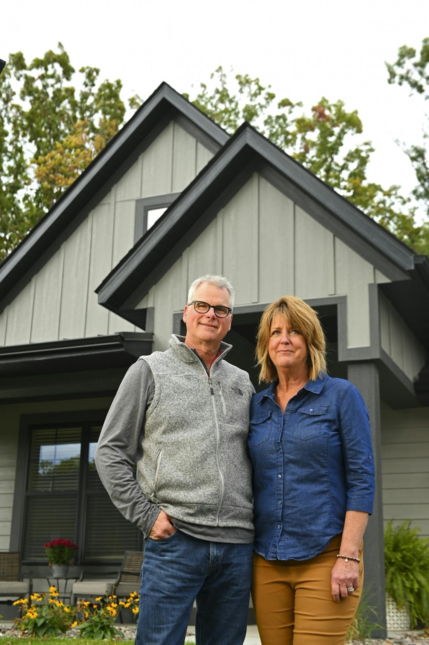 Empty nesters Ann and Scott Kemmitt outside their new rental home in Plymouth.