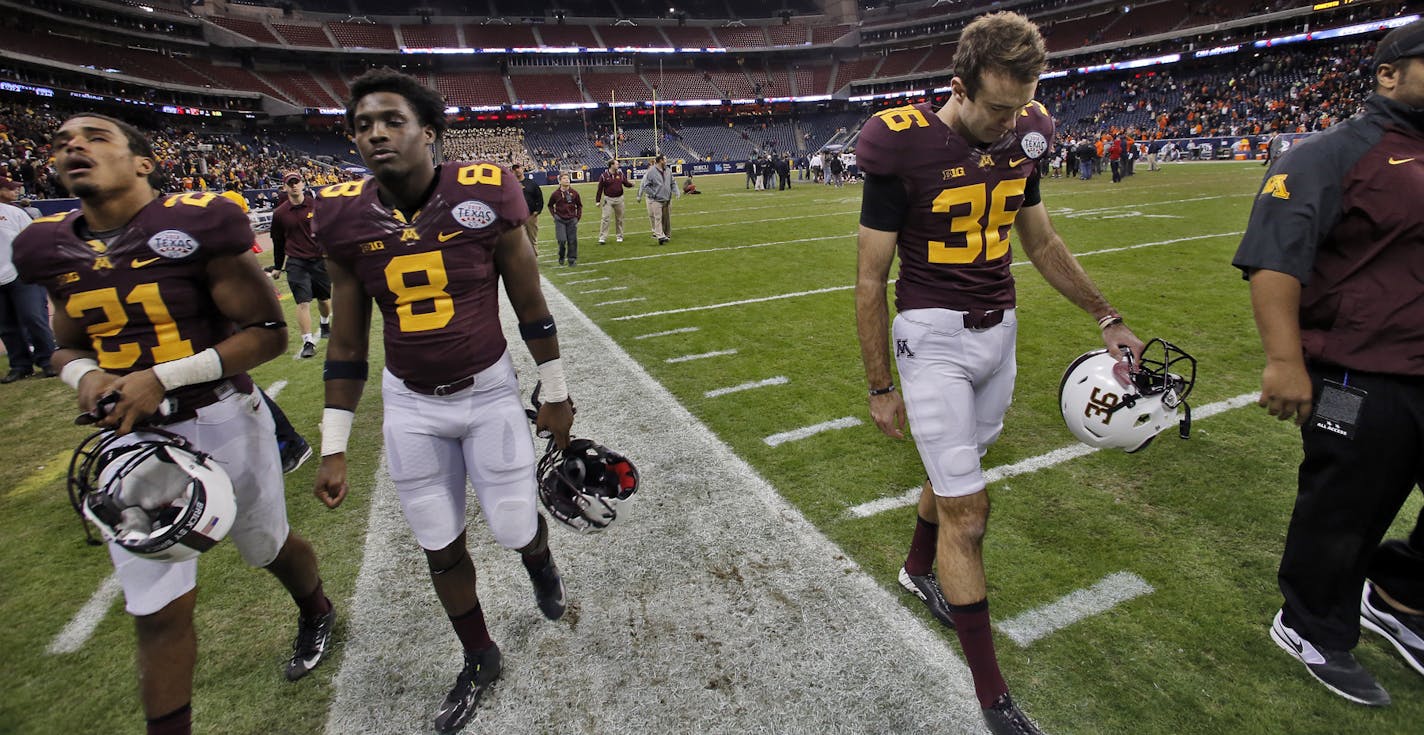 Minnesota Gophers vs. Syracuse Orange in Texas Bowl. Syracuse won 21-17. Minnesota players walked off the field at the end of the game as the score board proclaimed Syracuse the champions. (MARLIN LEVISON/STARTRIBUNE(mlevison@startribune.com)