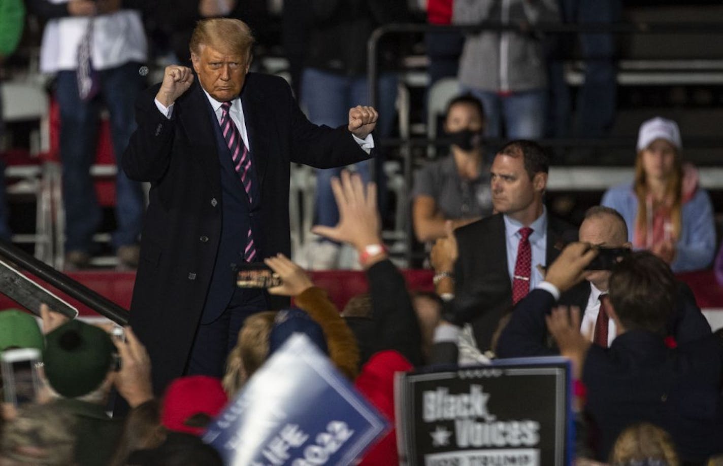 President Trump danced down the catwalk to "YMCA" Friday night in Bemidji as his supporters cheered him on after his speech there.