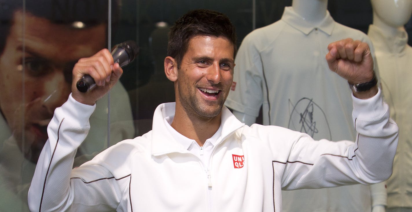 Serbian tennis star Novak Djokovic, officially unveils UNIQLO's Wimbledon collection at a central London store ahead of the grass tennis tournament later this month, Tuesday, June 18, 2013. (Photo by Joel Ryan/Invision/AP)