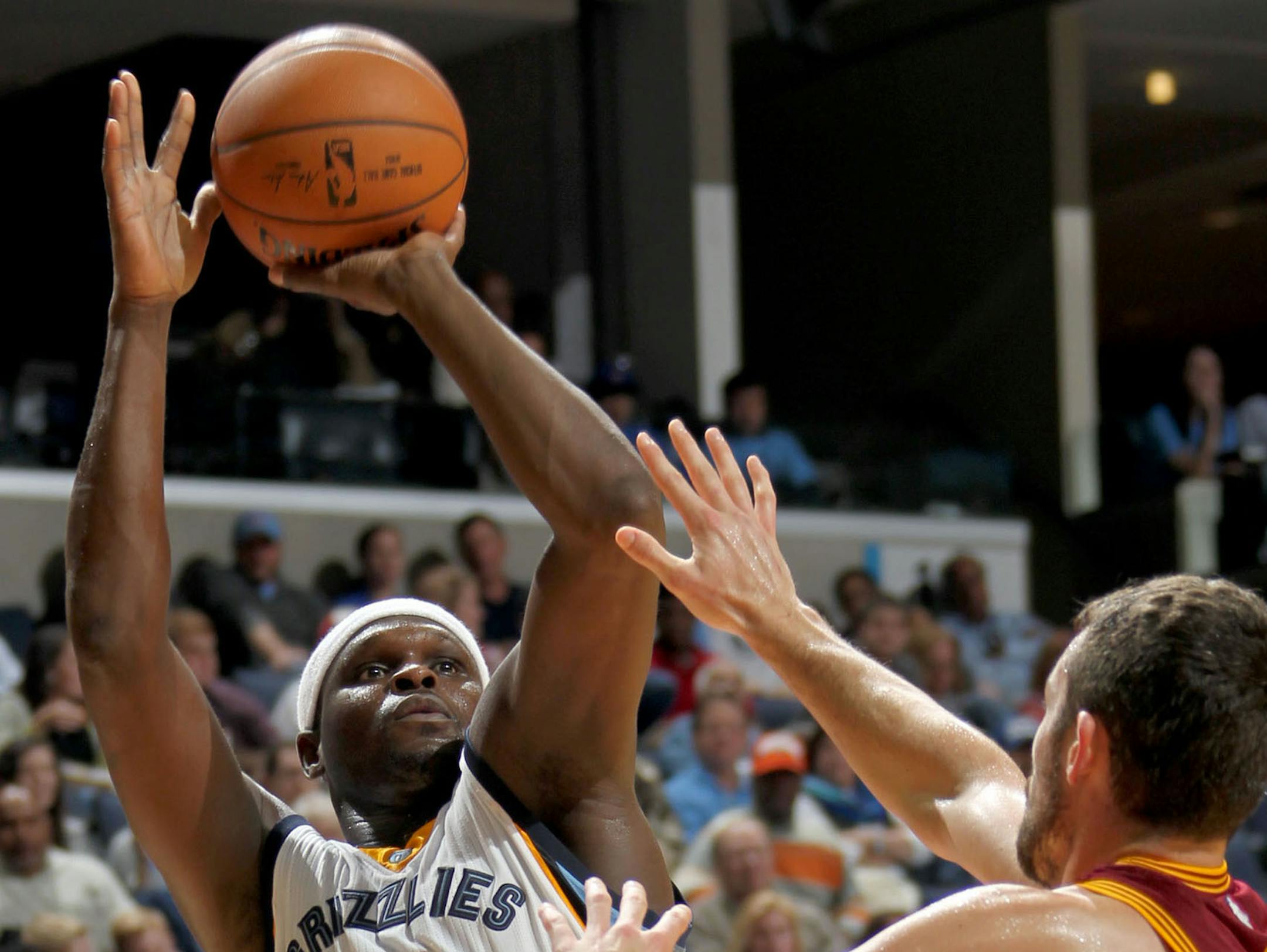 The Memphis Grizzlies' Zach Randolph (50) shoots against the Cleveland Cavaliers' Kevin Love during preseason action at FedExForum in Memphis, Tenn., on Wednesday, Oct. 22, 2014. (Nikki Boertman/The Commercial Appeal/MCT)
