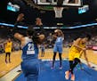 Lynx forward Rebekkah Brunson grabbed a defensive rebound after a missed shot by Los Angeles Sparks forward Candace Parker during Game 2 of the WNBA F