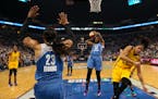 Lynx forward Rebekkah Brunson grabbed a defensive rebound after a missed shot by Los Angeles Sparks forward Candace Parker during Game 2 of the WNBA F
