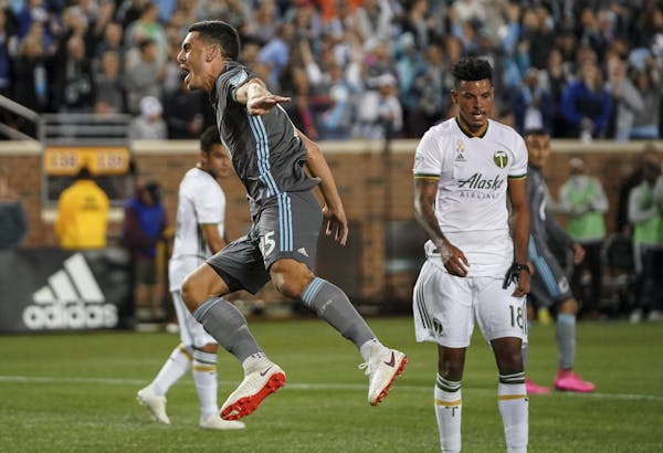 Minnesota United defender Michael Boxall (15) celebrated after scoring a first half goal against the Portland Timbers in the first half. ] AARON LAVIN