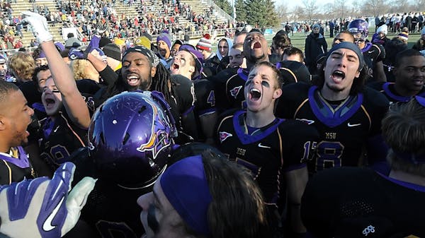 Minnnesota State Mankato players celebrate their 44-17 victory over Minnesota Duluth in the 2014 NCAA Division II quarterfinals. The NSIC rivals open 