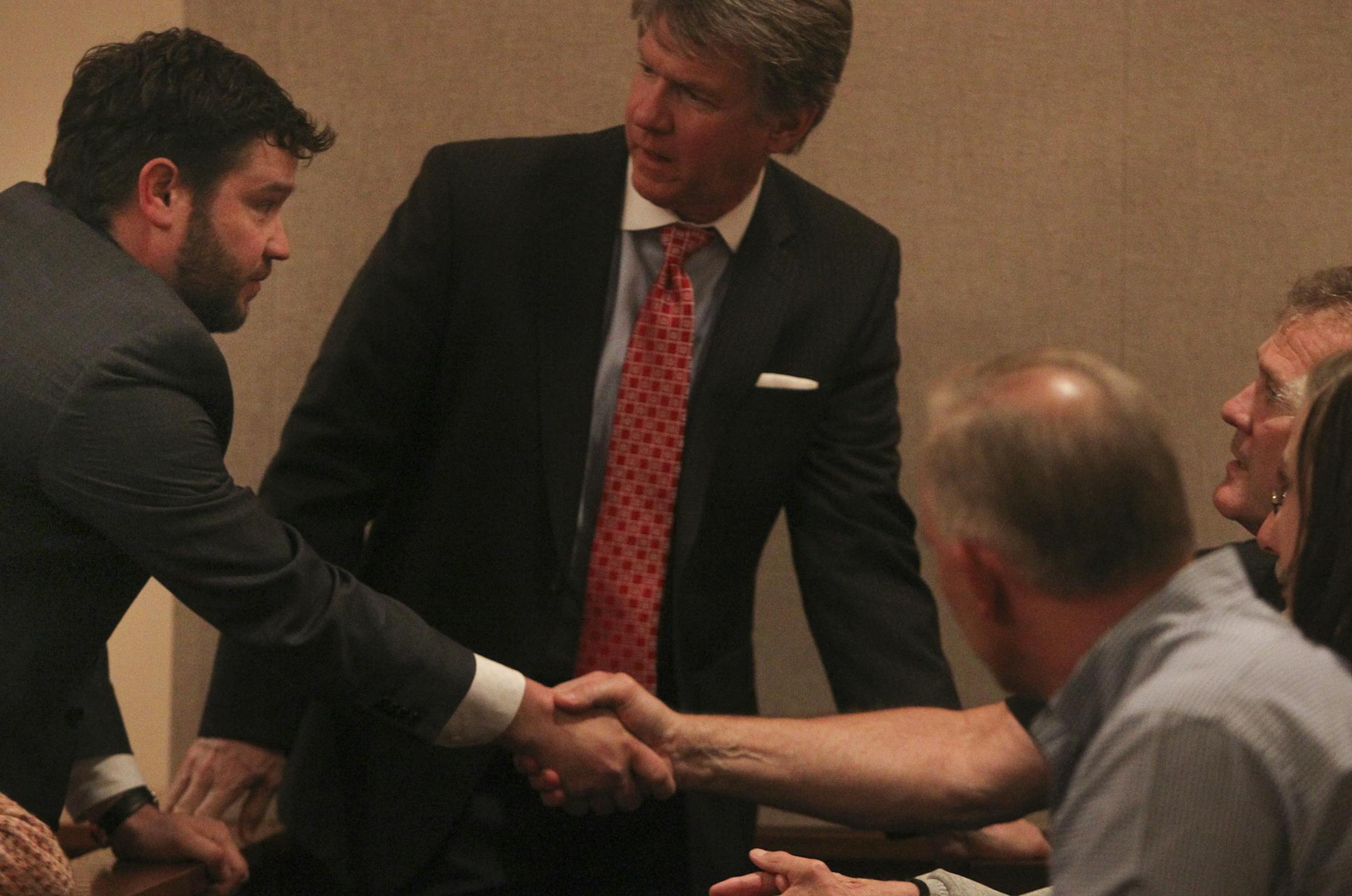 Attorney Eric Nelson, Amy Senser's attorney, left, shakes hands with Senser's husband Joe prior to the start of the Court of Appeals arguments before a panel of three judges Wednesday, May 1, 2013, at the Minnesota Judicial Center in St. Paul, MN. ](DAVID JOLES/STARTRIBUNE) djoles@startribune.com Amy Senser's Court of Appeals arguments before a panel of three judges nearly a year to the day from Senser's guilty verdict in a hit-and-run death of death of Anousone Phanthavongthat.