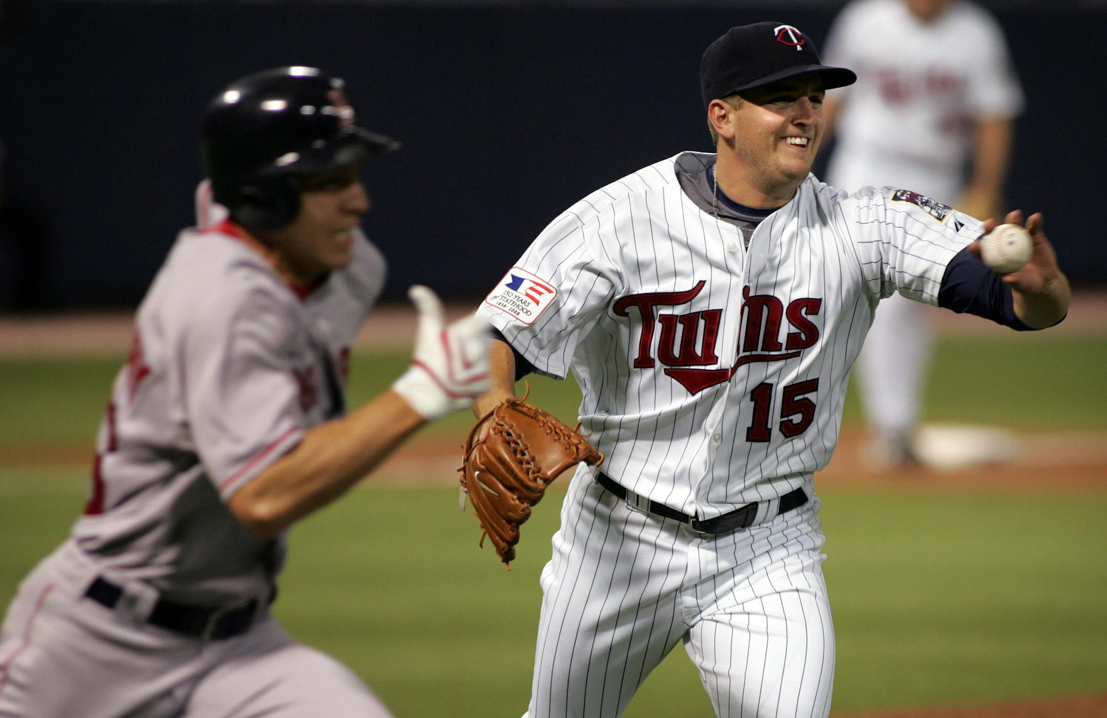 The Red Sox Jacoby Ellsbury could not beat Twins pitcher Glen Perkins' throw to first base during the fifth inning.