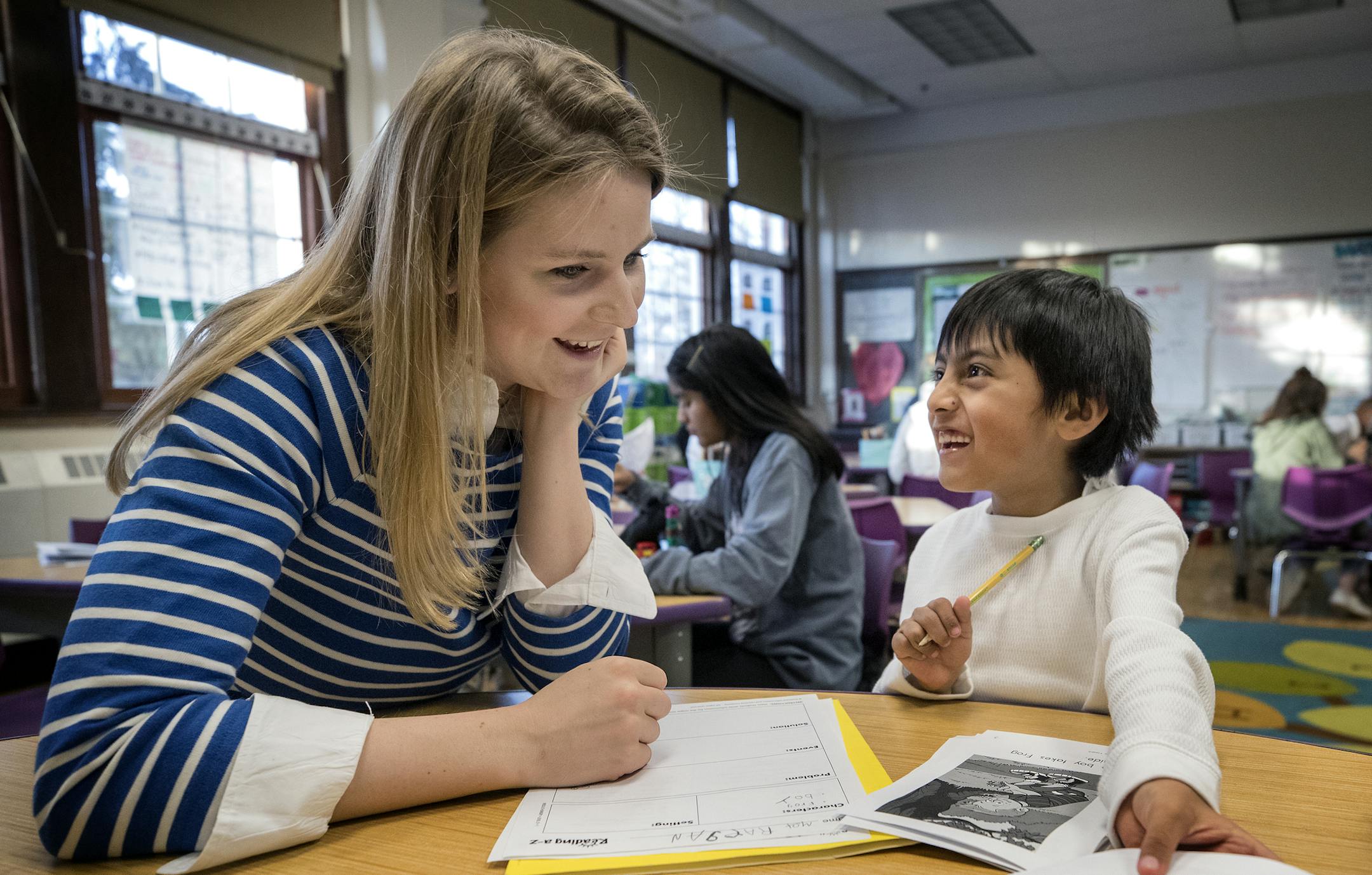Raegan Willis, 16, a junior at Minnetonka High School worked with Max Guallpa Naula, 6, at the Folwell School in Minneapolis. ] CARLOS GONZALEZ &#xef; cgonzalez@startribune.com - December 19, 2017, Minneapolis, MN, Minnetonka high school students will be at Folwell school to tutor elementary students.