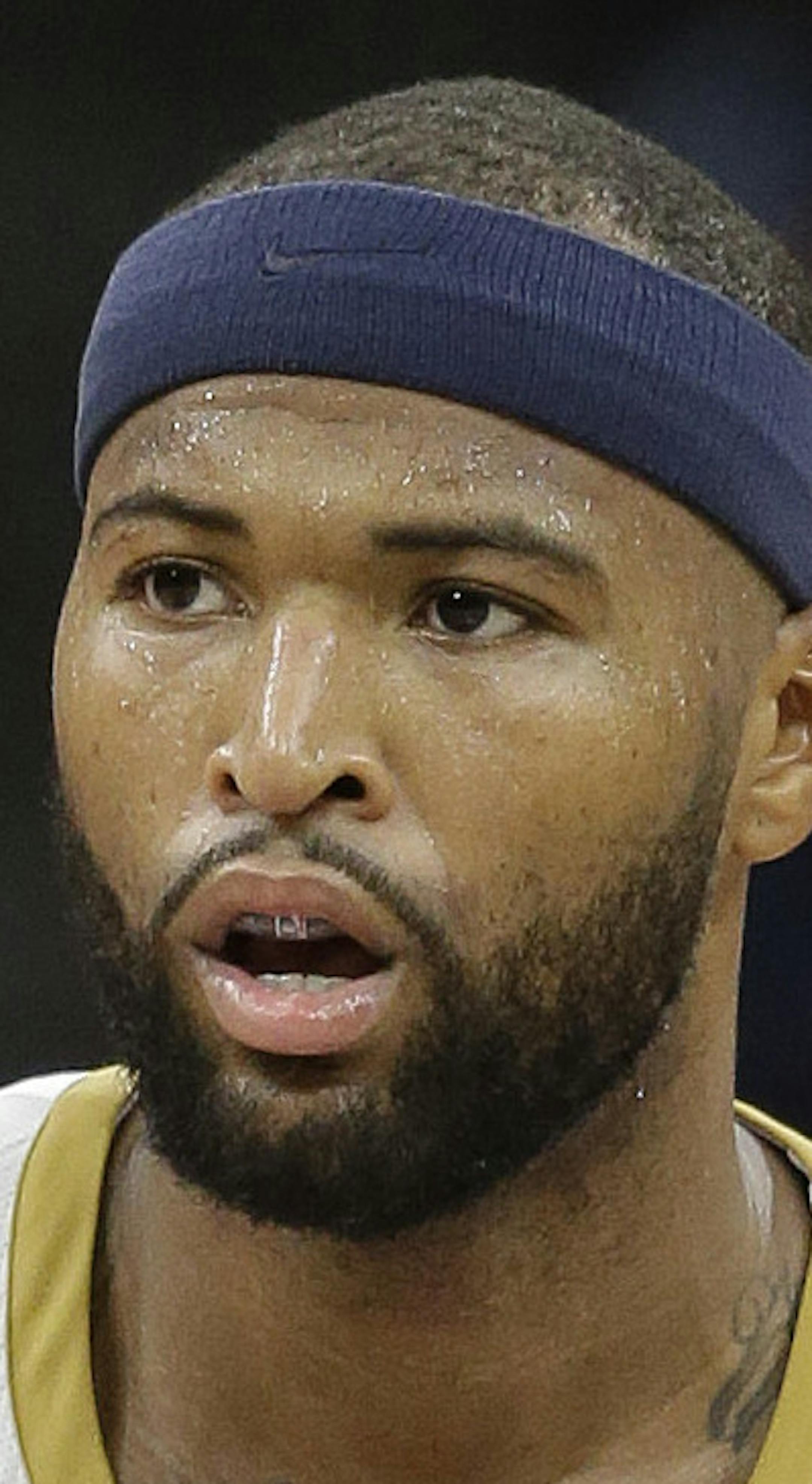 New Orleans Pelicans forward DeMarcus Cousins, left, is congratulated by teammate Jameer Nelson after he scored during the second half of an NBA basketball game Thursday, Oct. 26, 2017, in Sacramento, Calif. The Pelicans won 114-106. (AP Photo/Rich Pedroncelli)