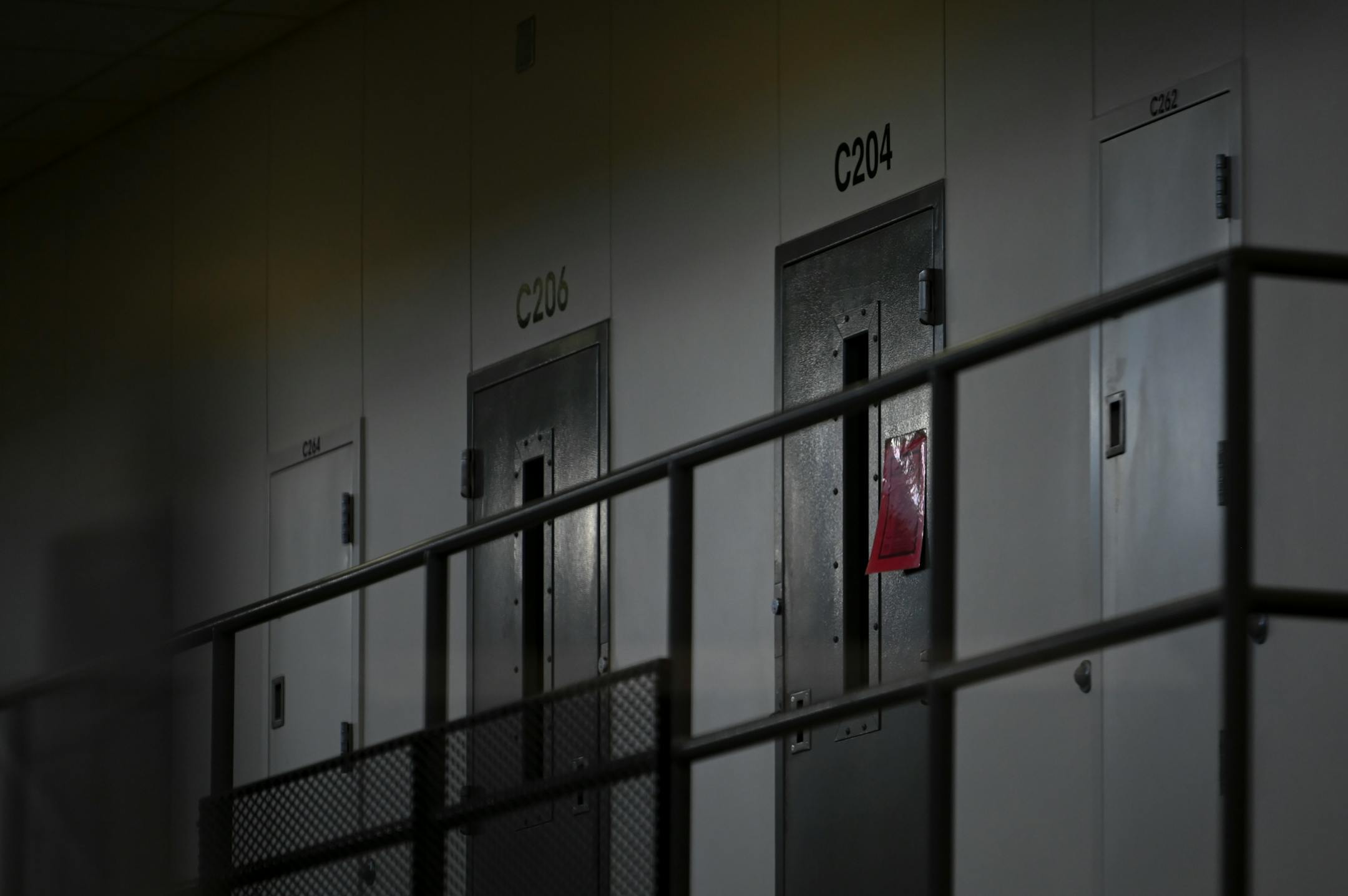 A 'Red Tag' on a cell door signifies an active COVID-19 case for its inhabitants.