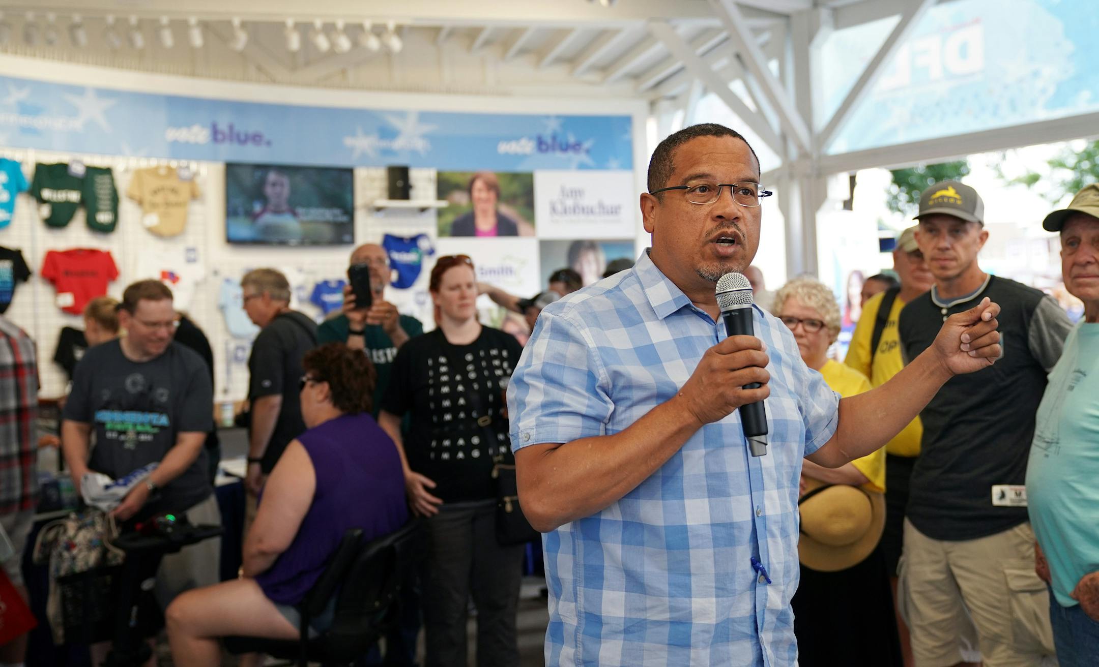 U.S. Rep. Keith Ellison, who's running for state attorney general, spoke with fairgoers Saturday. ] ANTHONY SOUFFLE ï anthony.souffle@startribune.com U.S. Rep. Keith Ellison, who's running for state attorney general, spoke with fairgoers Saturday, Aug. 25, 2018 in the DFL booth at the Minnesota State Fair in St. Paul, Minn.