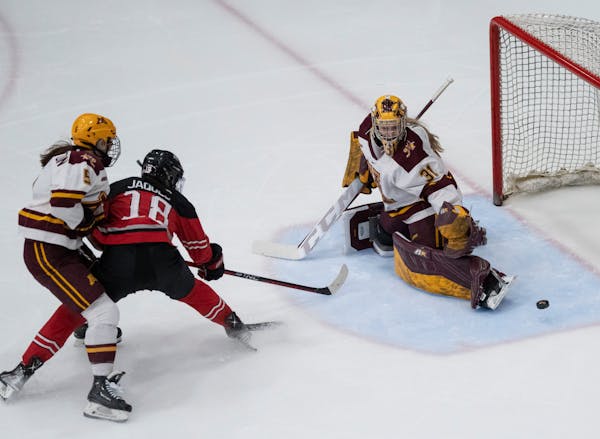 Minnesota goaltender Skylar Vetter (31) knocks a puck stopping Ohio State defenseman Sophie Jaques (18) form scoring in the second period. Gophers wom