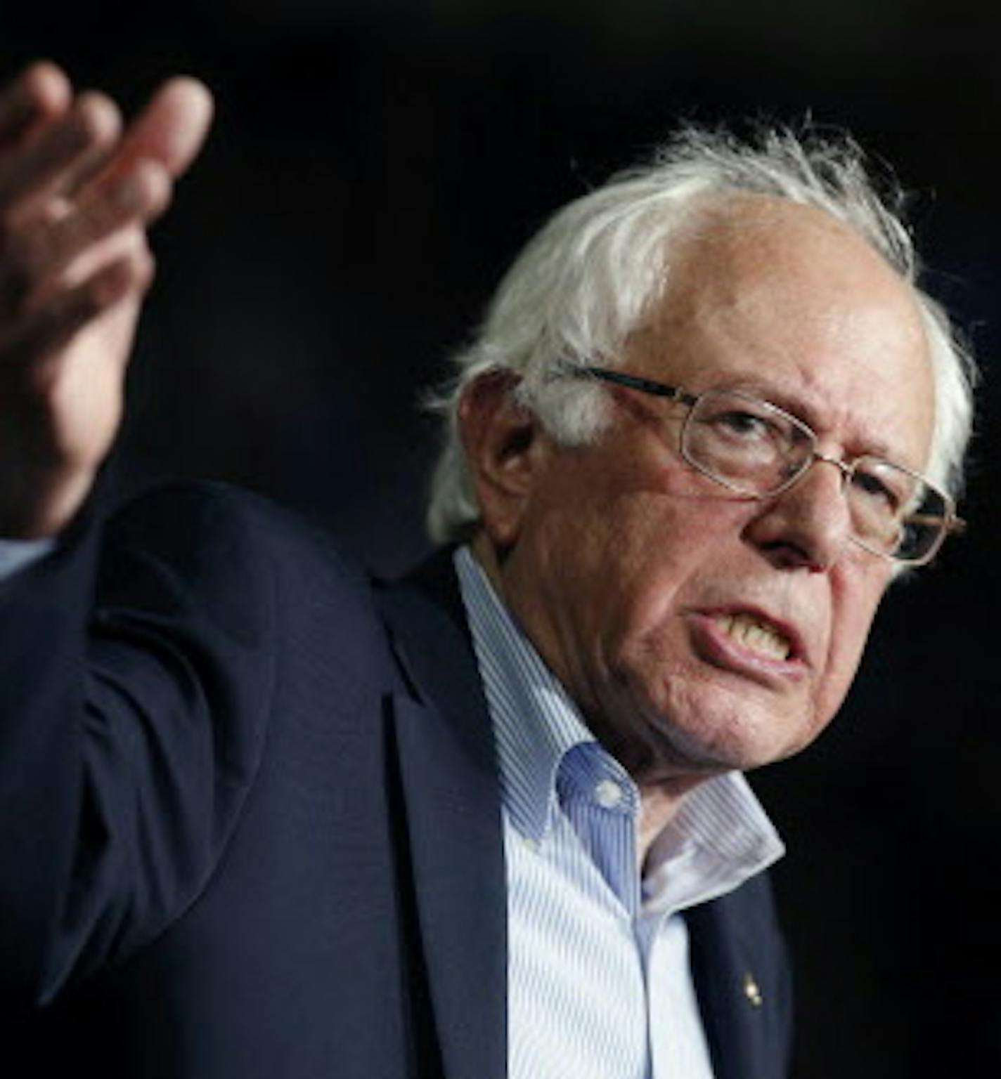 In this photo taken Oct. 3, 2015, Democratic presidential candidate, Sen. Bernie Sanders, I-Vt, speaks during a campaign rally in Springfield, Mass. The state where Hillary Clinton and Sanders will meet to debate on Tuesday, Oct. 13, for the first time is evidence of why she's still the front-runner. Clinton has staff organizing on the ground for months in Nevada and they know how to navigate the state's baroque caucus system. (AP Photo/Michael Dwyer)