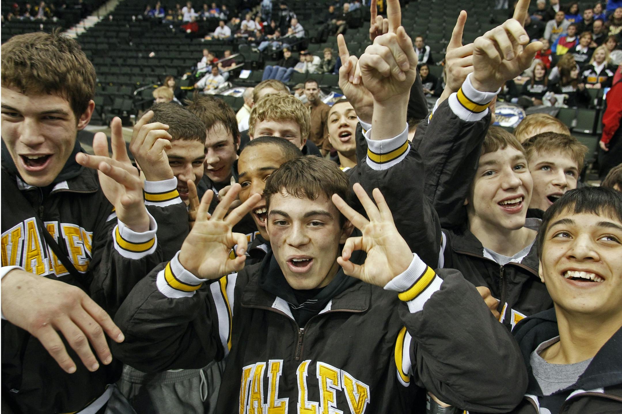 Destin McCauley signaled the number of consecutive team titles for Apple Valley — six — after the Eagles beat St. Michael-Albertville in the Class 3A final Thursday.