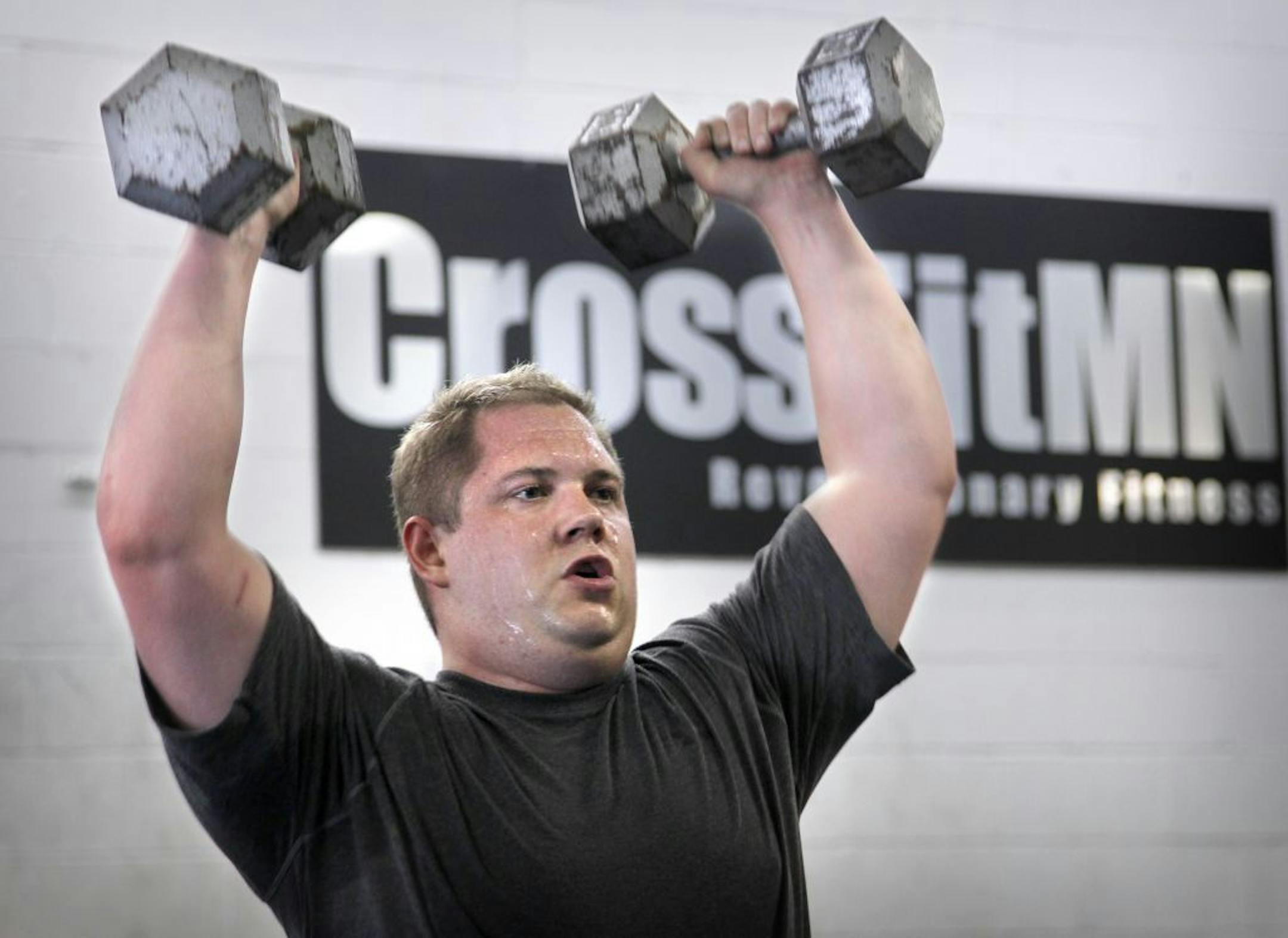 Kevin Oie works out three or four times a week at CrossfitMN on Bush Lake Road in Edina. The workout changes each day.