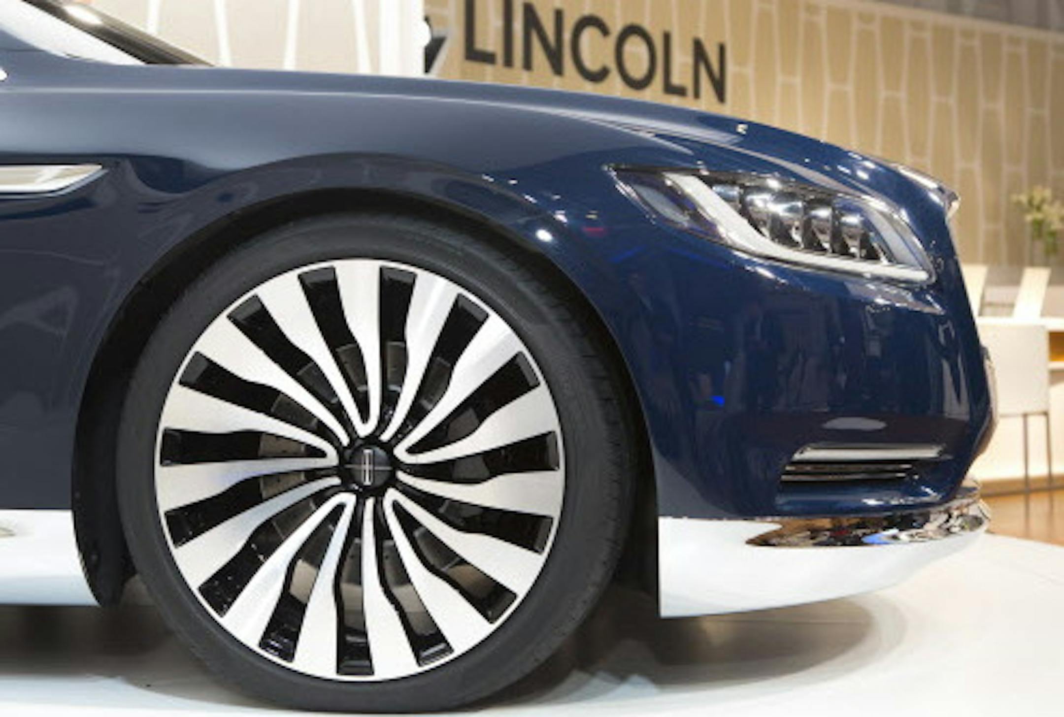 A Lincoln Continental concept car is shown at the New York International Auto Show, Monday, March 30, 2015, in New York. Thirteen years after the last Continental rolled off the assembly line, Ford Motor Co. is resurrecting its storied nameplate. The production version of the full-size sedan goes on sale next year. (AP Photo/Mark Lennihan)