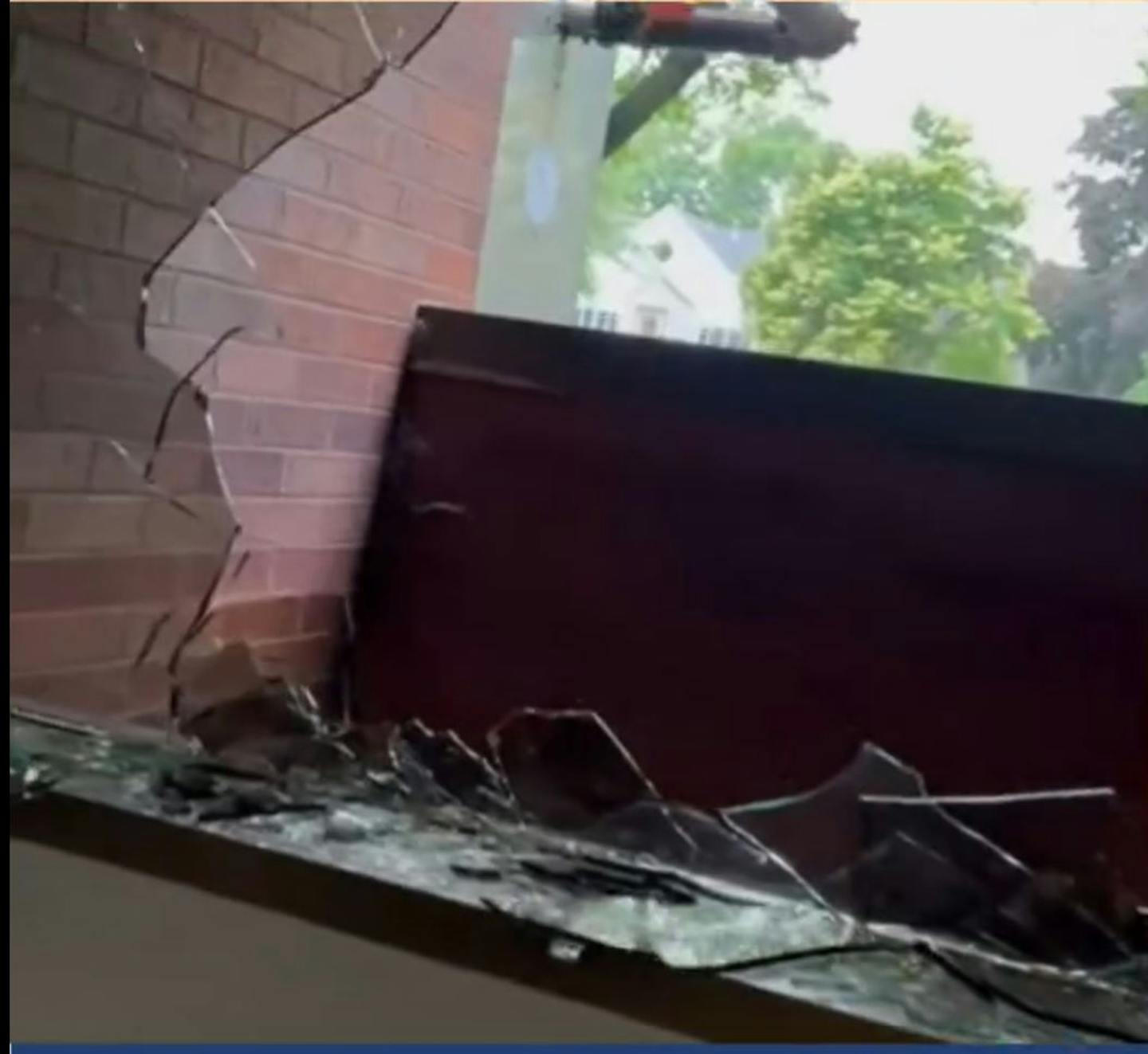 A broken window at the new Tibyan Center in St. Anthony