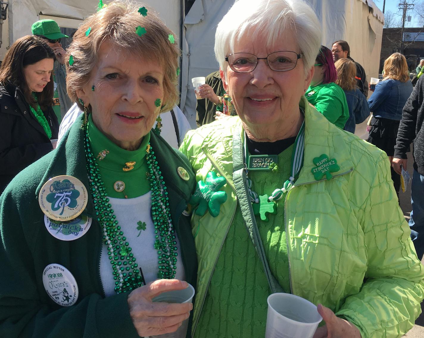 Colleen McNellis (left), 74, and Judy Niemann, 78, have patronized O'Gara's for 70 years. The sisters used to tag along with their father when he stopped by for a beer, then kept the tradition alive each St. Paddy's day as adults. ] Credit: Liz Sawyer, Star Tribune