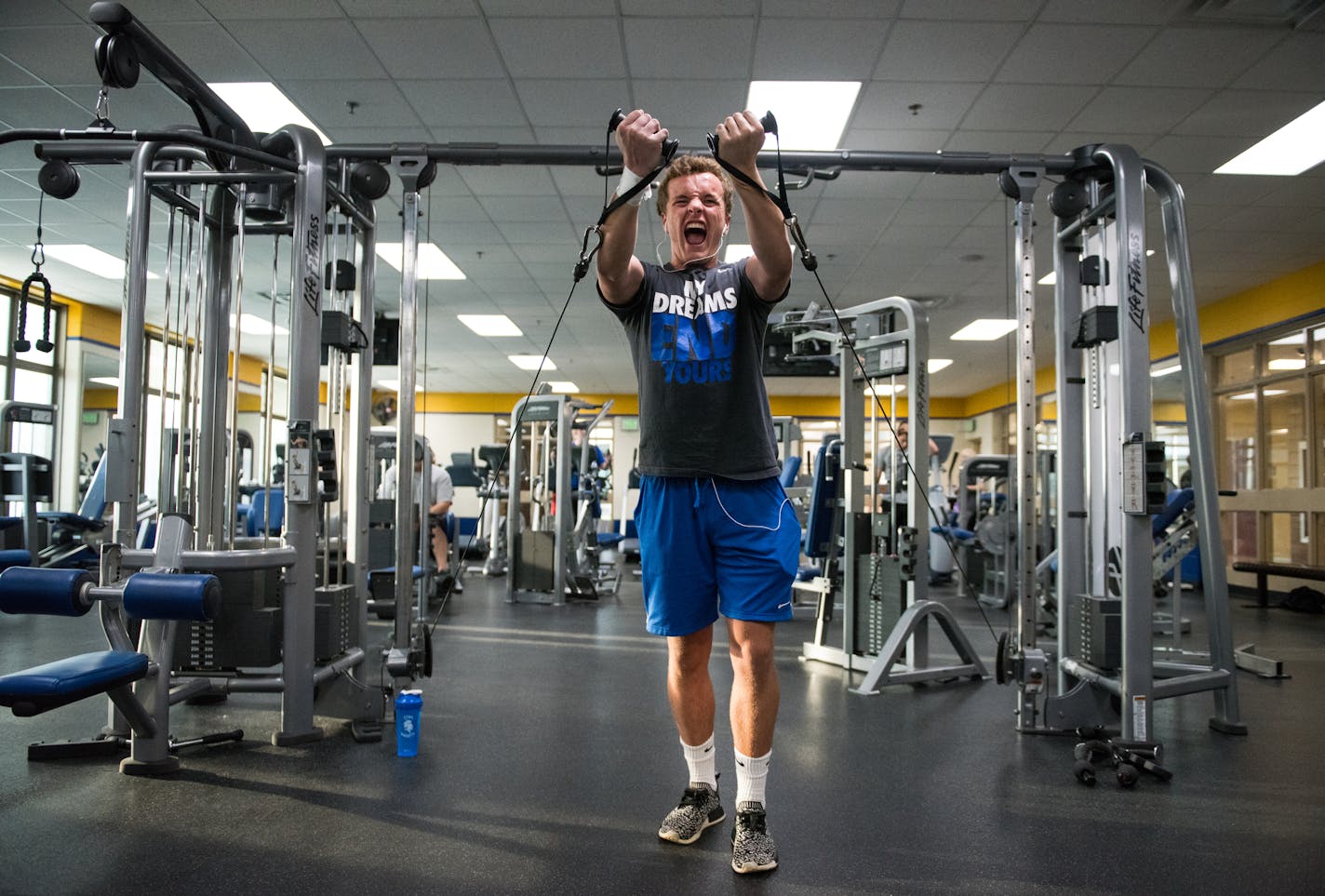 St. Michael-Albertville junior Joey Bennett worked out in his school's fitness center Wednesday. The new workout facility is a benefit to Bennett, a two-sport athlete, as well as a draw in the community, where people can buy memberships to train there.