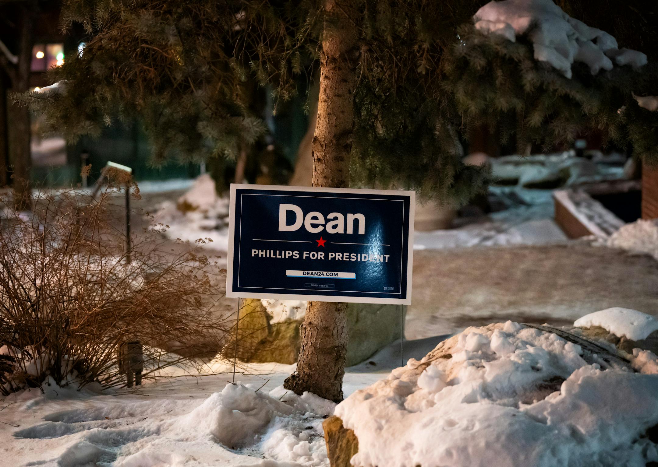 A campaign sign stuck in a snow bank outside where Dean Phillips spoke to a crowd gathered at The Brothers Cortado coffee shop Friday, Jan. 19, 2024  Concord, New Hampshire.    ] GLEN STUBBE • glen.stubbe@startribune.com