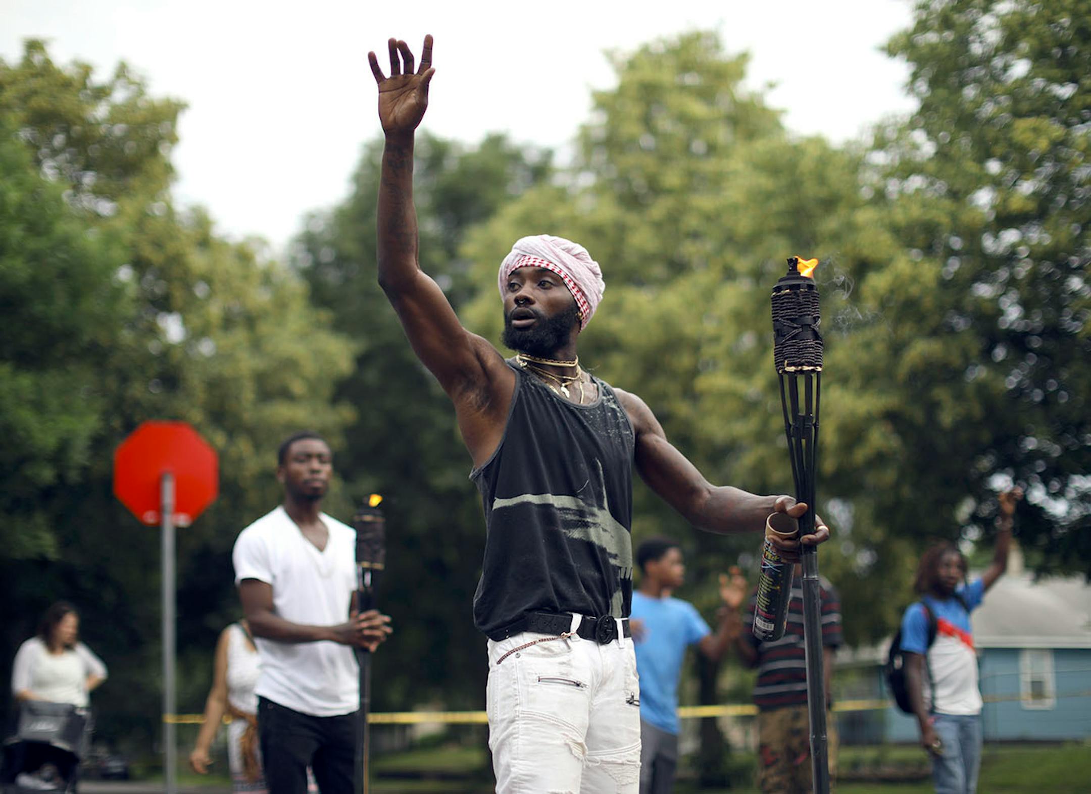 Jerome Peters Jr. asked neighborhood residents and others gathered at the intersection of 47th and Aldrich Ave. N. about how they were feeling in the wake of another shooting.