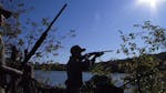 KYNDELL HARKNESS�kharkness@startribune.com
Alex Strand, 15, kept his sights on a small flock of merganser ducks during the duck opener Saturday morn