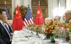 FILE-- President Donald Trump at a bilateral dinner meeting with President Xi Jinping of China during the Group of 20 summit at the Hyatt Palace Hotel