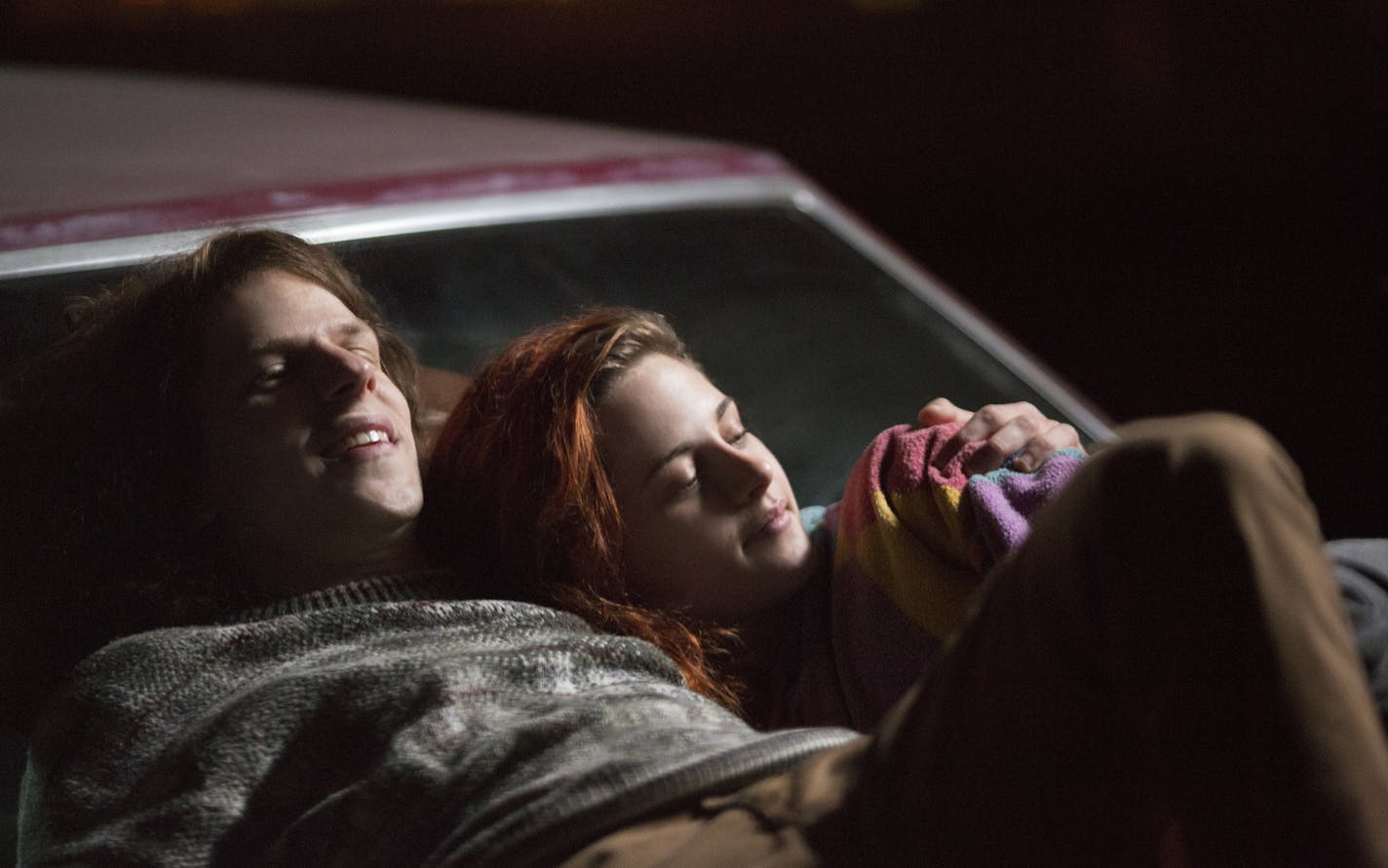 In this image released by Lionsgate, Jesse Eisenberg, left, and Kristen Stewart appear in a scene from "American Ultra." (Alan Markfield/Lionsgate via AP)