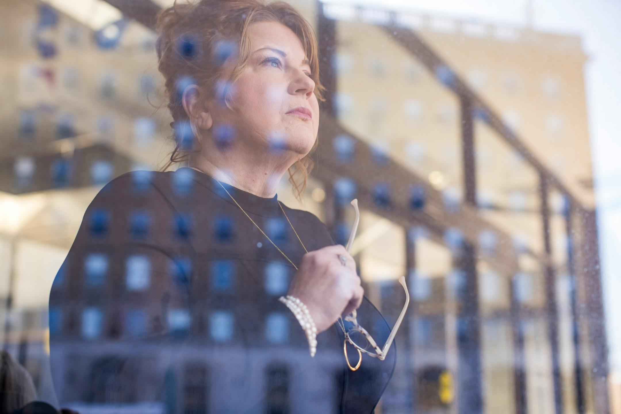 Portrait of Shereen Siewert, the founder and editor of the Wausau Pilot &amp; Review, in her office.