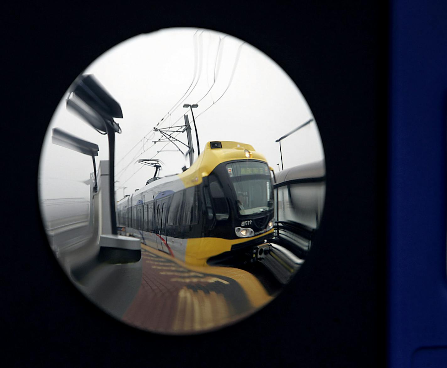 A light rail train was reflected in a mirror at the 28th Avenue station in Bloomington.