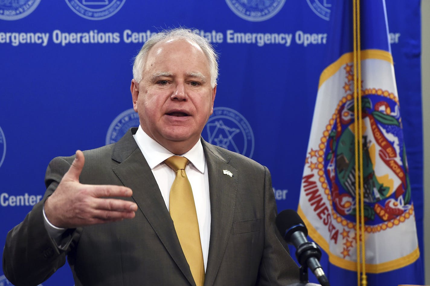 Minnesota Gov. Tim Walz provides an update on the state's response to COVID-19 during a news conference on Monday, April 20, 2020 in St. Paul, Minn. At the news conference, Walz and Ecolab CEO Doug Baker discussed the role of public-private partnerships in Minnesota's fight against COVID-19. (Scott Takushi/Pioneer Press via AP, Pool)