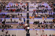 Volleyball teams from across the country compete on multiple courts simultaneously during the Northern Lights Qualifier, a tournament for teams trying