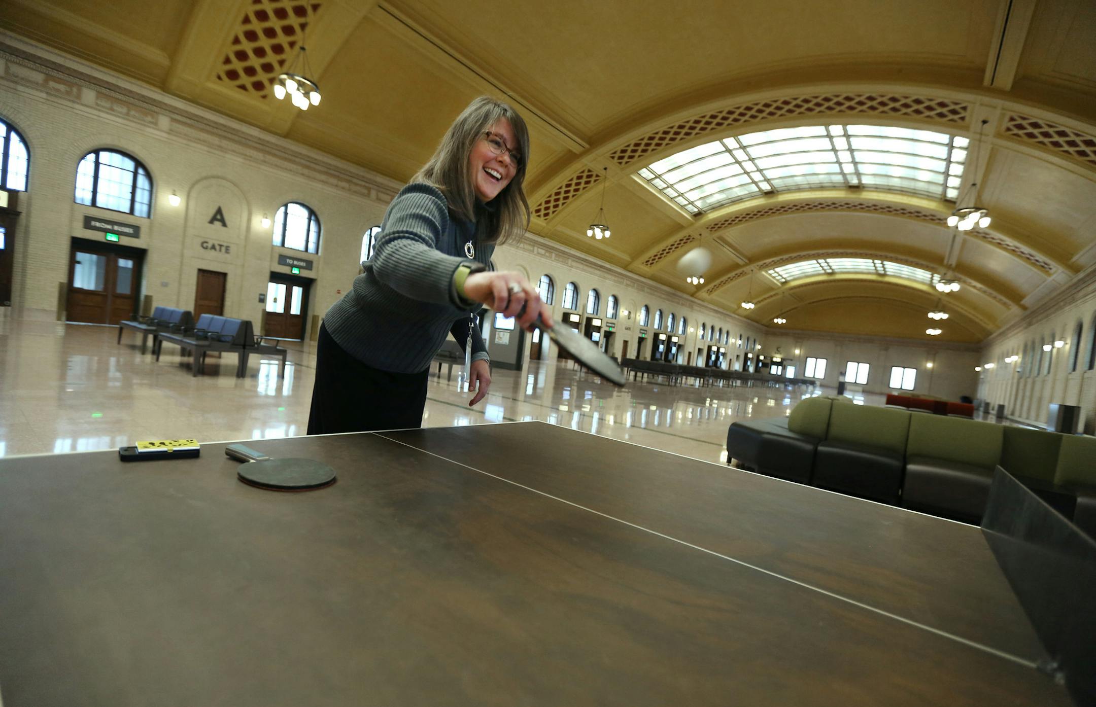 Deborah Carter McCoy played ping pong on the "Union Table" at the Union Depot Wednesday October 30, 2013 in St Paul, MN.Ramsey County Board pledged $1.25 million of the Union Depot's $243 million renovation project to be directed to public art in the refurbished train station, it wasn't kidding. In the last few months, new art works have been installed at the depot, reflecting its location deep in the Lowertown artists' colony. ] JERRY HOLT ‚Ä¢ jerry.holt@startribune.com