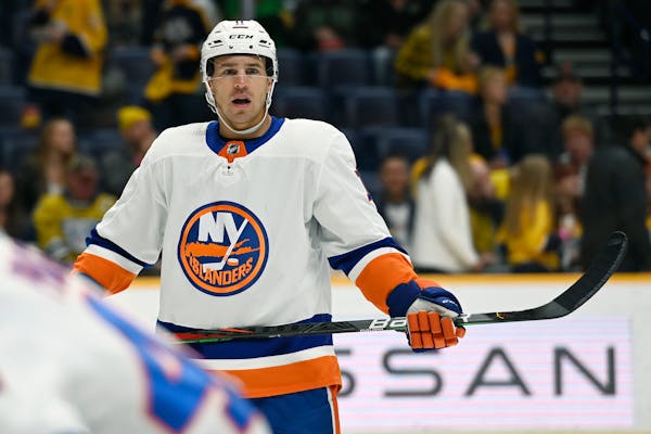 New York Islanders left wing Zach Parise (11) plays against the Nashville Predators during first period of an NHL hockey game Saturday, Oct. 30, 2021,