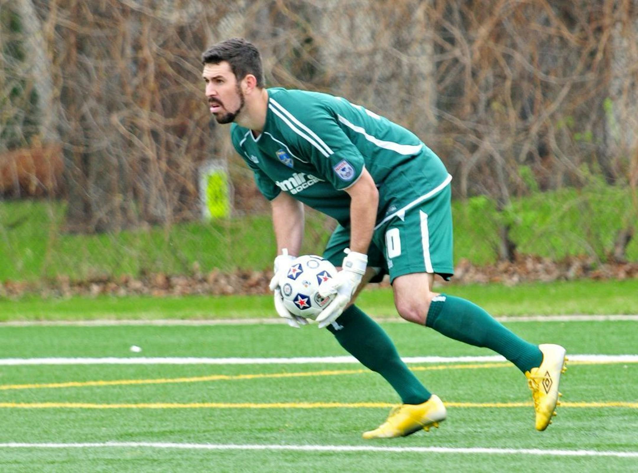 Minnesota Stars' goalkeeper Matt VanOekel (30) recovers a shot on net during the first half of an exhibition game against FC Edmonton at Parade Stadium Monday, April 2, 2012.