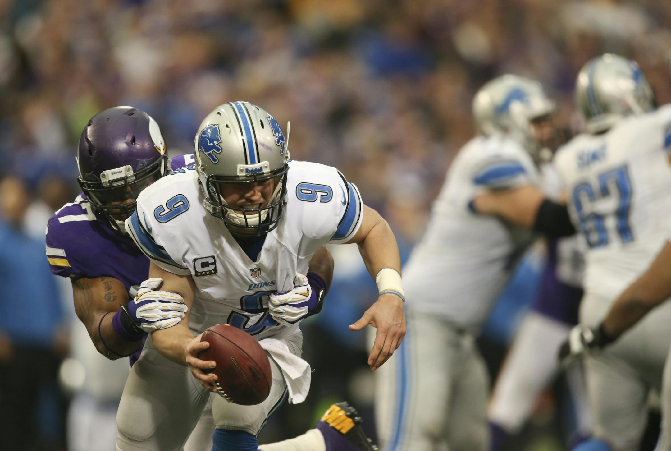 The Minnesota Vikings defeated the Detroit Lions 14-13 in their final game of the season and the last game ever in the Metrodome Sunday afternoon, December 29, 2013 in Minneapolis. Detroit Lions quarterback Matthew Stafford (9) was sacked for a 13 yard loss by Minnesota Vikings defensive end Everson Griffen (97) in the fourth quarter.