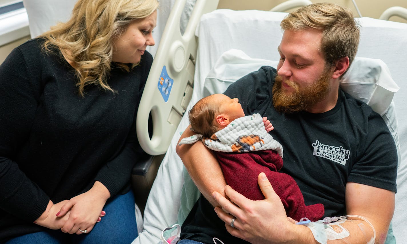 Andrew Goette, flanked by his wife Ashley. cradles his four-day-old son Lennon Andrew in his hospital bed. Andrew expects to be discharged as soon as tonight. ] MARK VANCLEAVE &#xef; mark.vancleave@startribune.com * Ashley Goette woke up last Tuesday morning to discover her husband Andrew struggling to breath and in cardiac arrest. Despite being 39-weeks pregnant, Ashley administered CPR until first responders whisked Andrew away to United Hospital in St. Paul where she joined him hours later, n