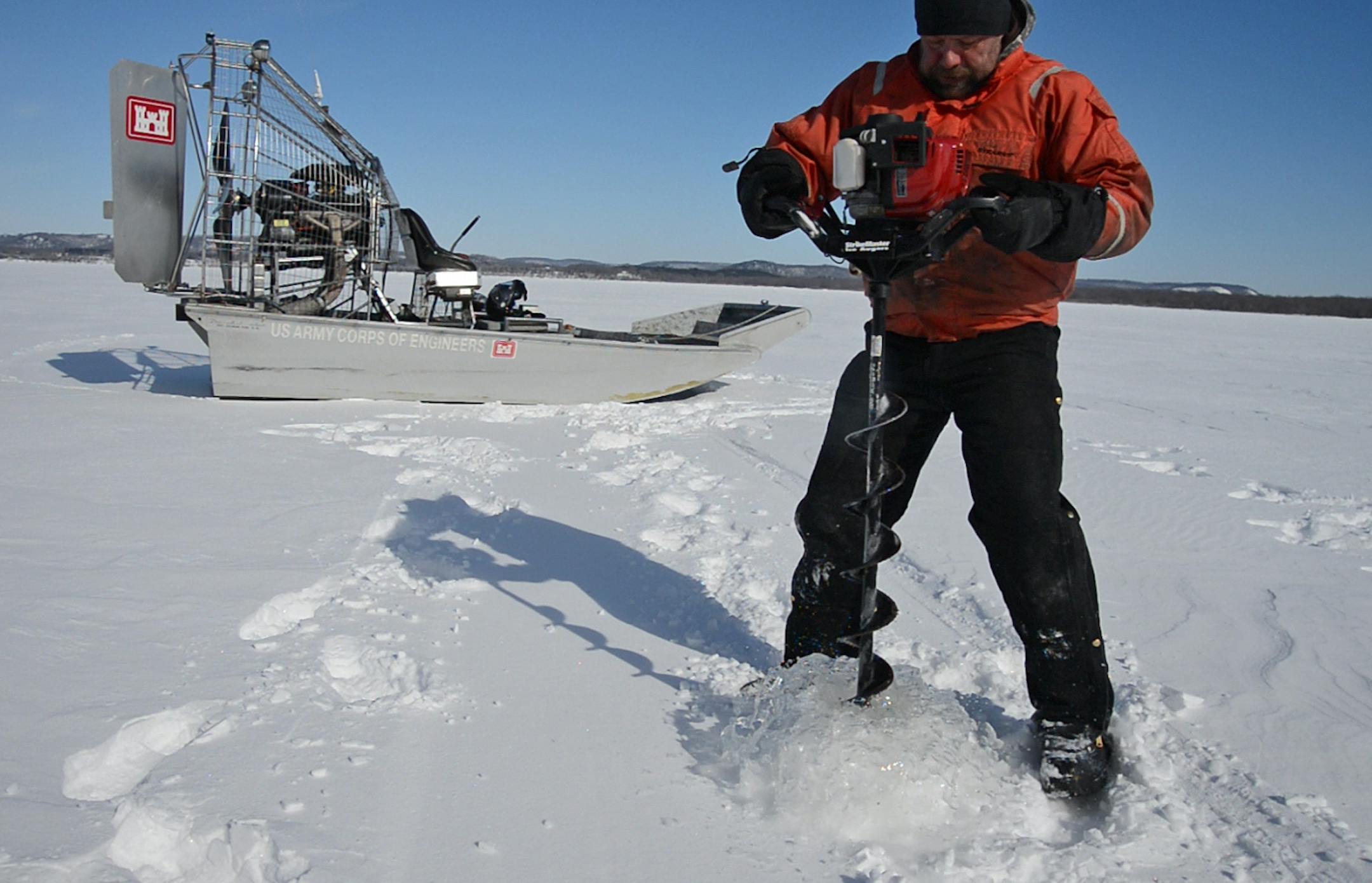 Bill Chelmowski Small craft operator for the US Army Corps of Engineers drilled a hole to measure the depth of Lake Pepin near Camp Lacupolis.] U.S. Army Corps of Engineers officials were in airboats to take first measurements of ice thickness on Lake Pepin - which will offer a clue about when shipping season, and spring, will arrive. Richard.Sennott@startribune.com Richard Sennott/Star Tribune Wabasha , Minn Thursday 2/27/2014) ** (cq)