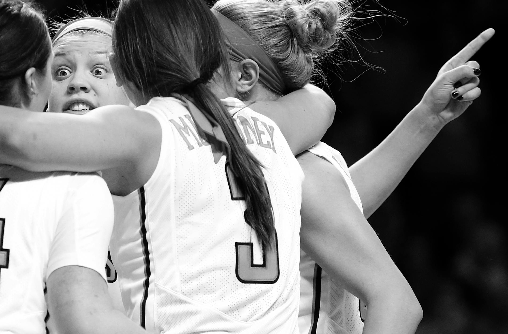 Rachel Banham (1) huddled up with teammates during a game vs. Iowa. Minnesota beat Iowa by a final score of 78-76. Banham finished with 35-points.