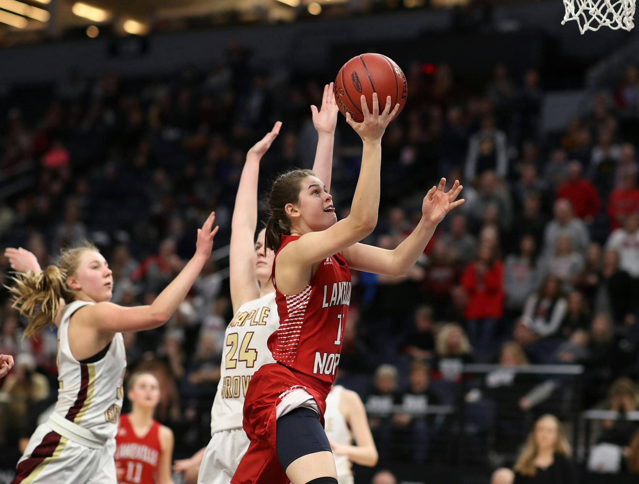 Lakeville North Lauren Jensen scored a basket sending the game into overtime during girls class 4A quarter final action at Target Center Wednesday March 14, 2018 in Minneapolis, MN.] Lakeville North beat Maple Grove 68-66 in overtime at Target Center . JERRY HOLT ï jerry.holt@startribune.com